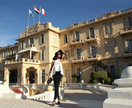 The Global Girl Travels: Ndoema sports a classic black and white hat look at the Sofitel Winter Palace Hotel in Luxor, Egypt.