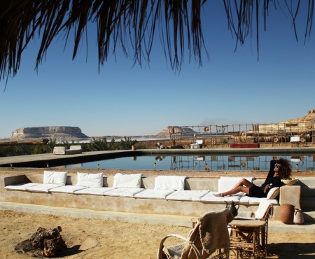 The Global Girl Travels: Relaxed and chic in a Moroccan-inspired batwing dress and tribal bracelets, Ndoema explores desert eco-chic living at luxury eco-lodge Talist at Siwa Oasis in the Libyan desert.